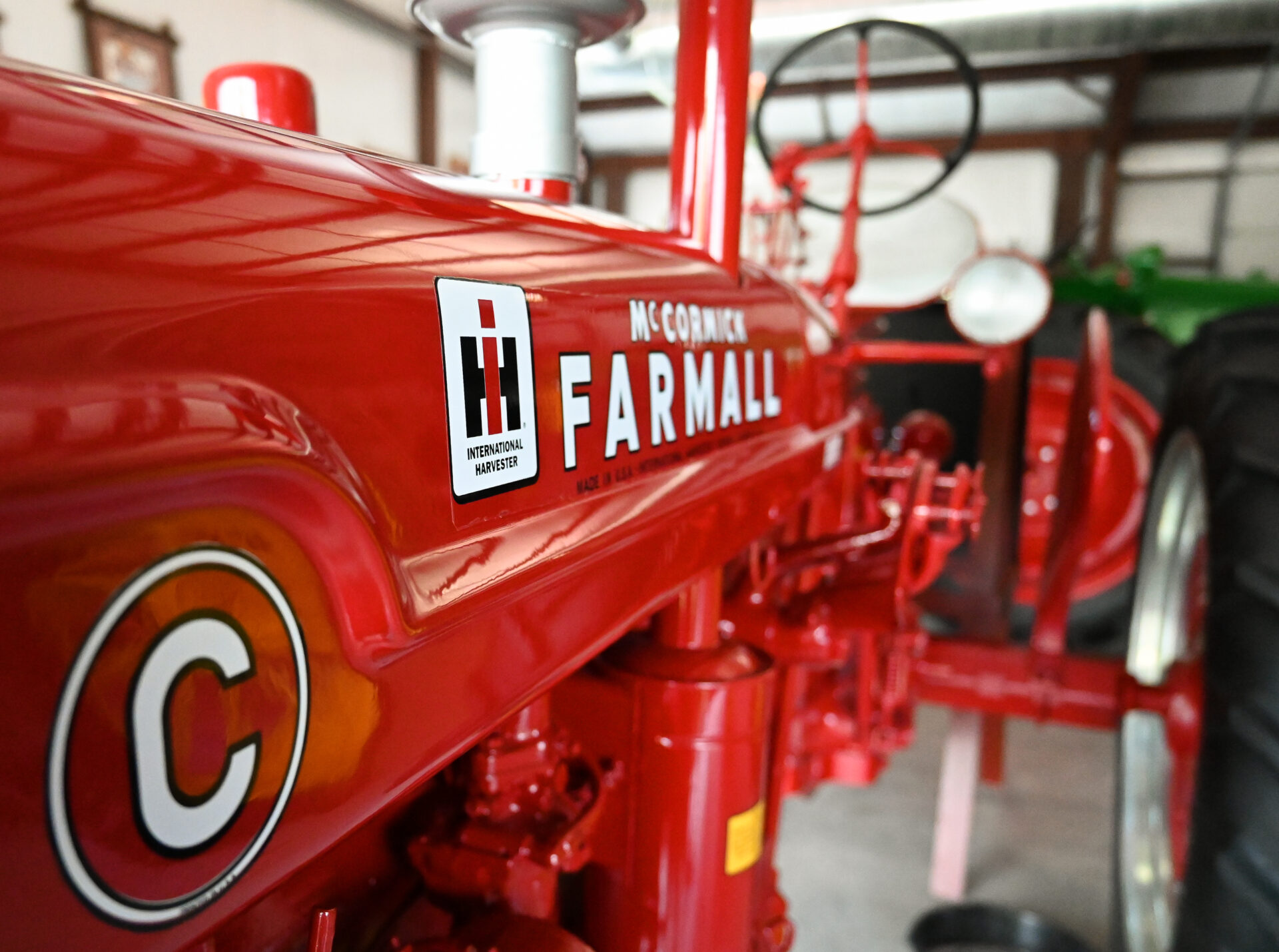Close-up of red McCormick Farmall tractor