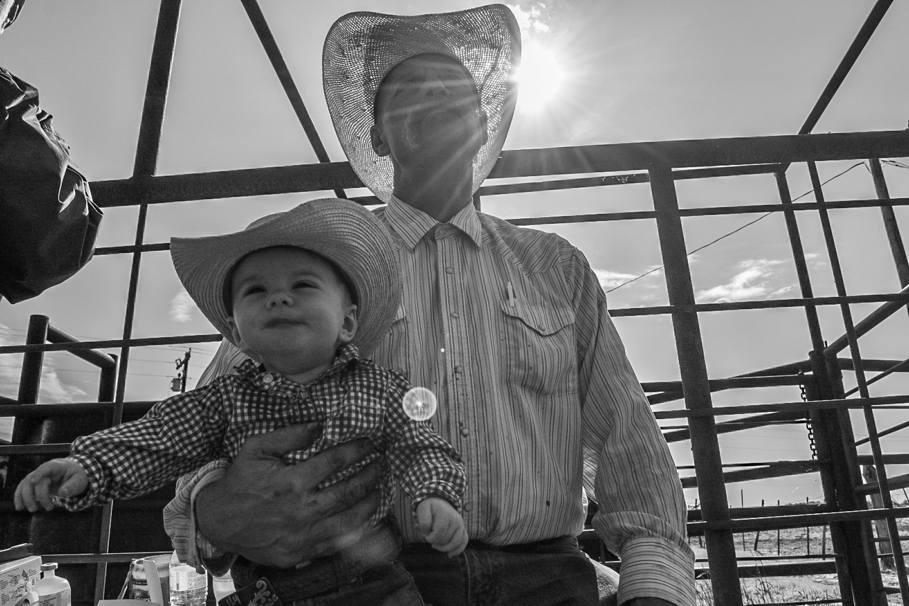 Two generations of cowboys