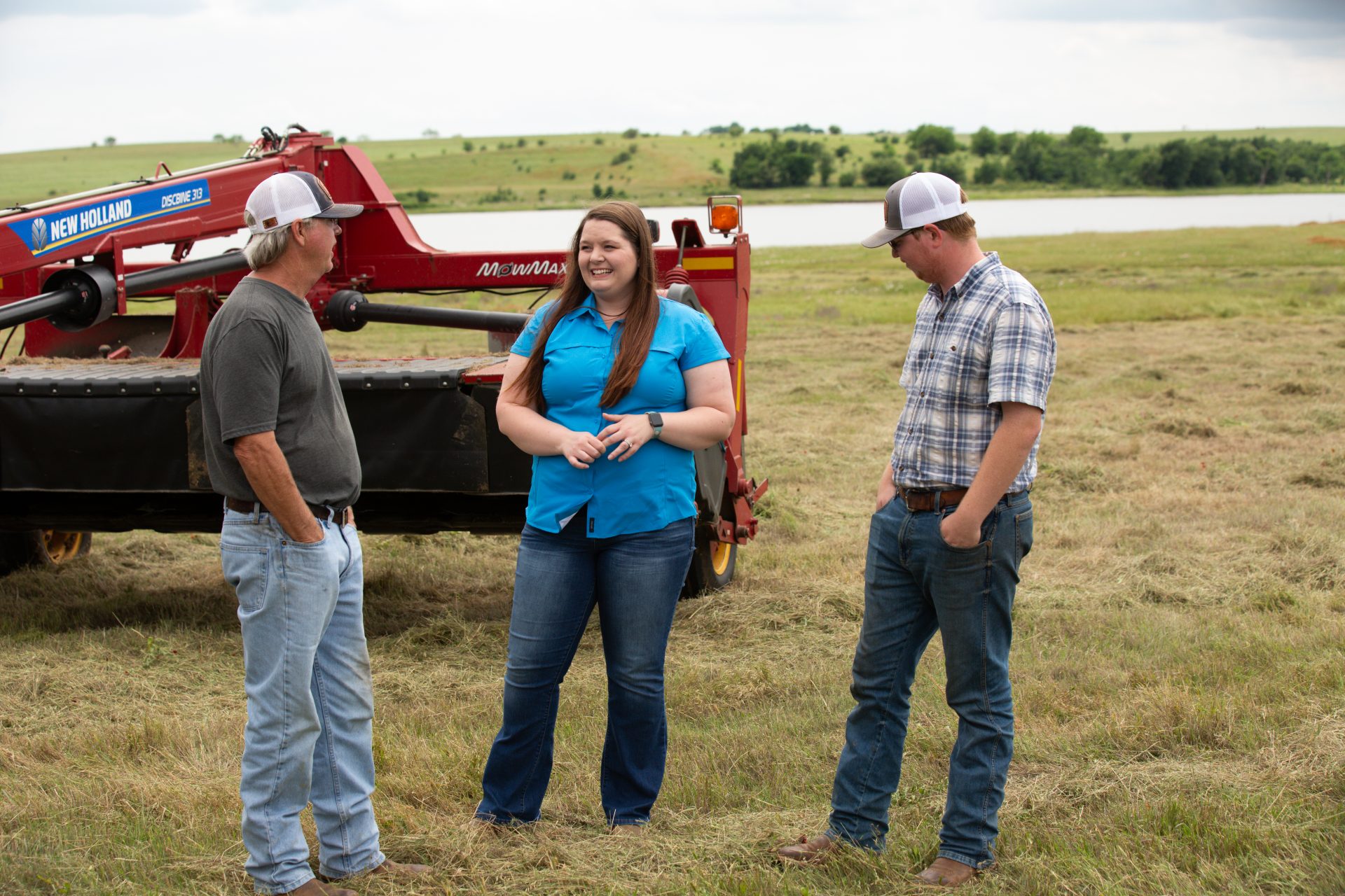Tyler Shockley, his father, and their AgTrust lender, Hannah Baker