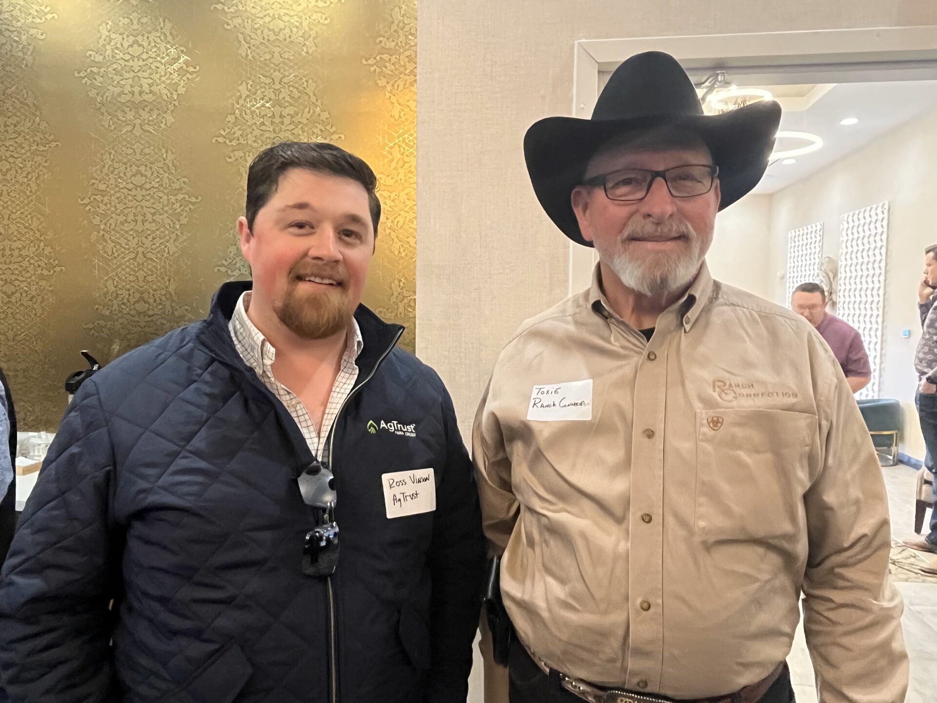Ross Vinson with a realtor at Texas Alliance of Land Brokers Luncheon- Feb 2024