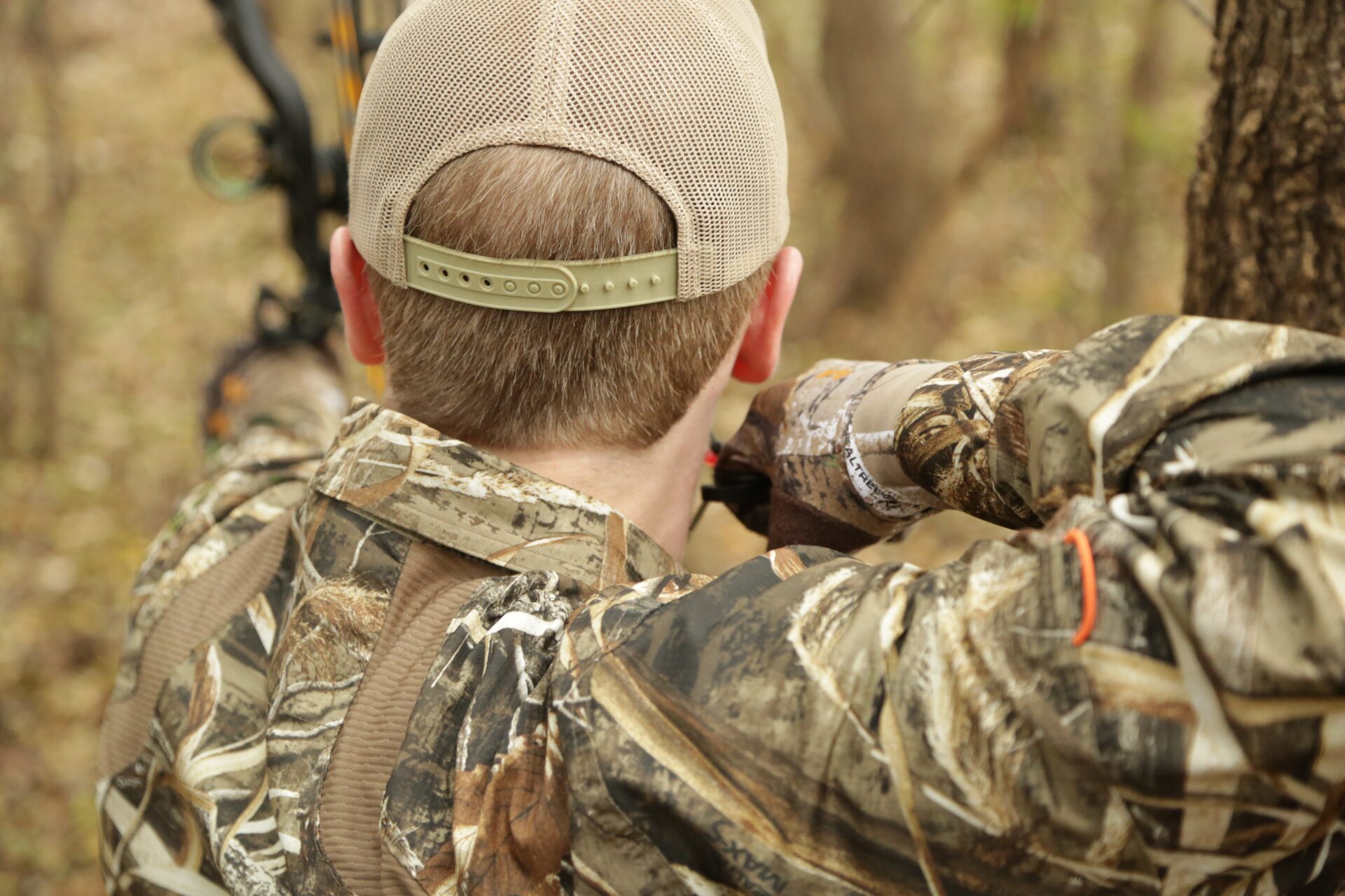 Man in camo hunting in the woods